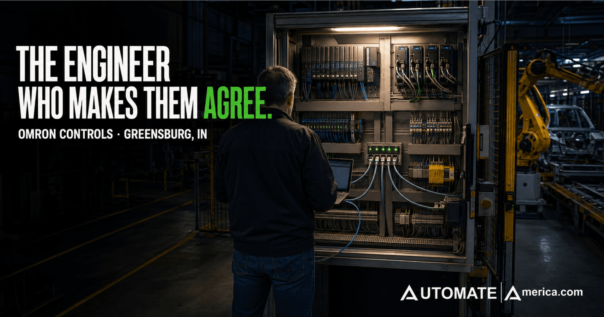 Controls engineer programming an Omron PLC and HMI on an automotive final assembly line in Greensburg, Indiana